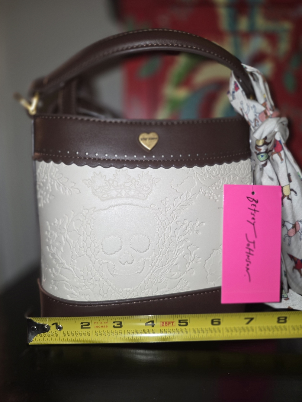 Betsy Johnson Cream and Brown Skull Embossed Bucket Bag by